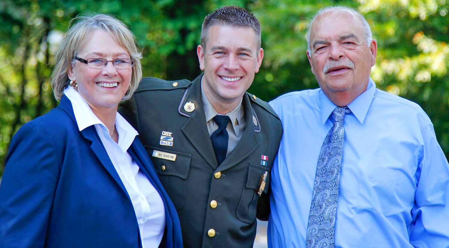 With my parents on the day of my promotion ceremony to the rank of Sergeant