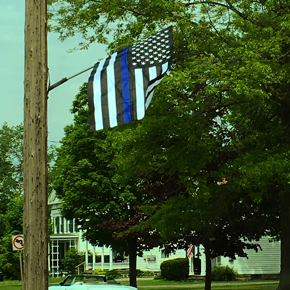 Thin blue line flag near our Police Station