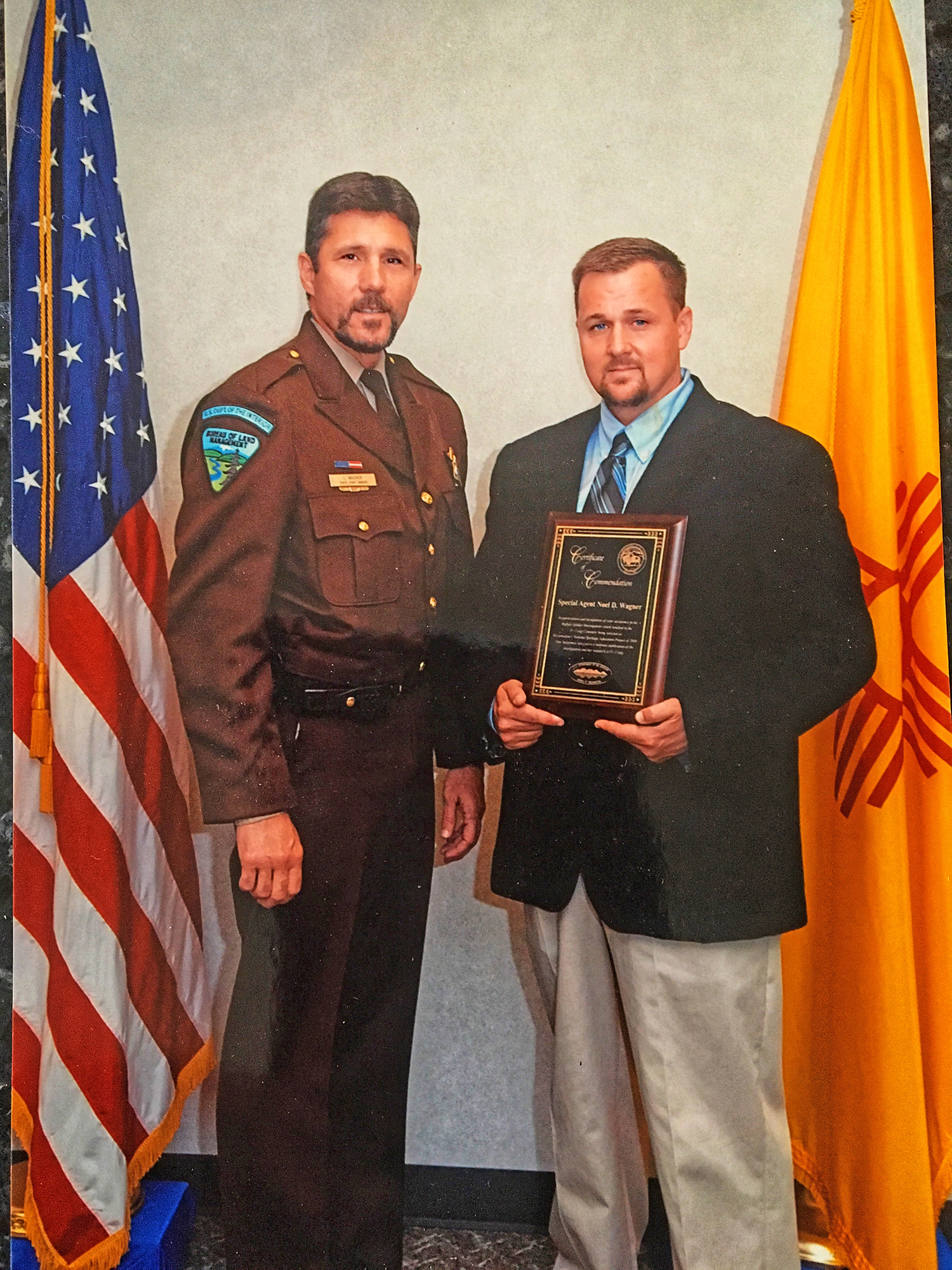Special Agent Noel Wagner (right) and Bureau of Land Management Ranger Lanny Wagner (Brother on left) at FBI recognition ceremony.